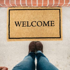 A welcome mat. Photo by Marissa Daeger on Unsplash