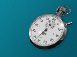 A stopwatch on a teal background. Photo by William Warby on Unsplash